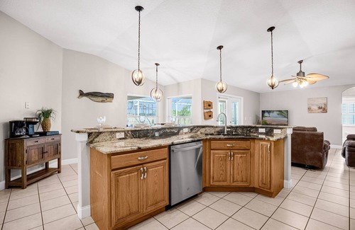 Buena Ventura Lakes House | Upstay - Waterside Home With Pool and Hot Tub