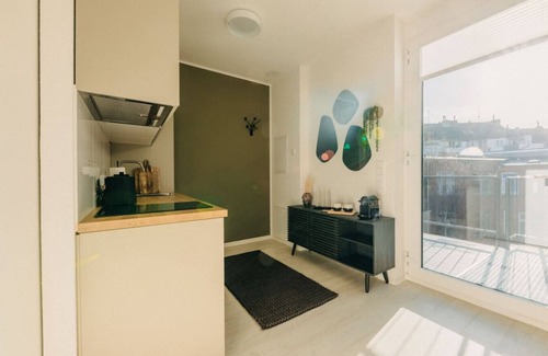 Friedrichstadt Apartment | Urban Elegance | Balcony | Bright Design Oasis