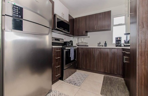 New Kingston Condo | Urban Haven New Kingston with Pool Cozy & Modern, Centrally located