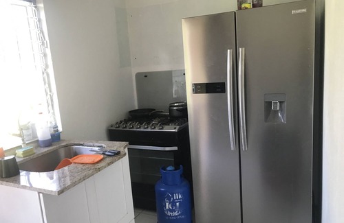 Spanish Town Zone House | Urban stay