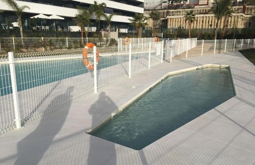 Estepona Apartment | Urban style apartment with 1 bedroom swimming pool padel piste