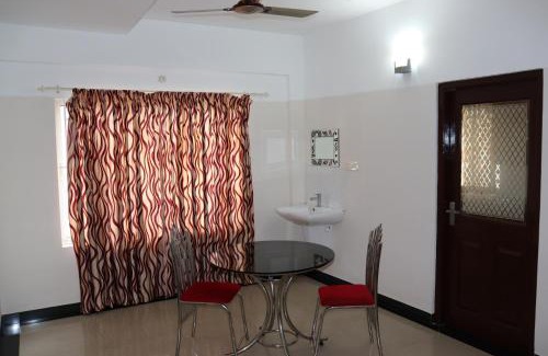 University of Kerala Senate House Campus Hotel | Uthradam towers