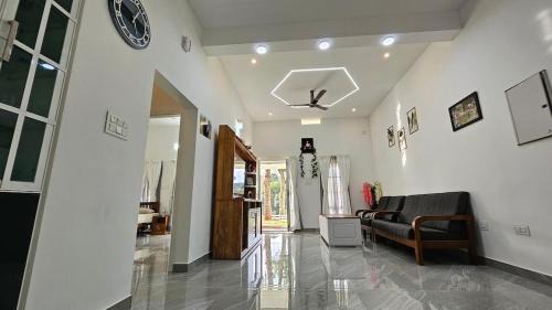 Udumbanchola Apartment | Uthuppan's Bedroom with the waterfall view