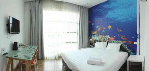 Taman Pertama Hotel | V Garden Hotel
