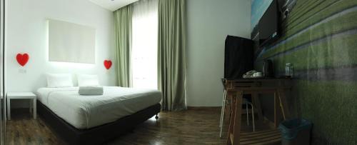 Taman Pertama Hotel | V Garden Hotel