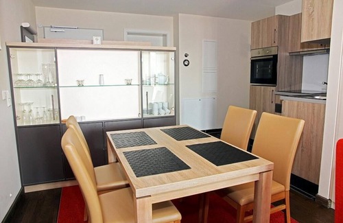 Wremen Apartment | Vacation apartment near the beach with sauna, balcony with beach chair and wonderful view