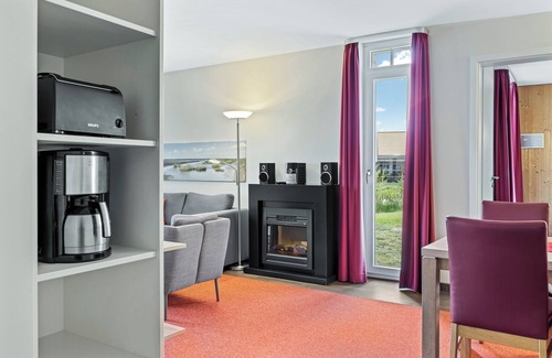 Wremen Apartment | Vacation apartment near the beach with sauna and great, sunny terrace with beach chair