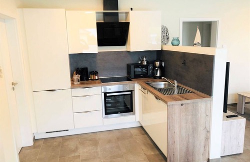 Fedderwardersiel Condo | Vacation apartment Seestern with sauna, directly on the dike