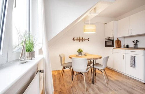 Ostersiel Apartment | Vacation apartment "Aalmutter" - relaxed vacation with a view in the attic