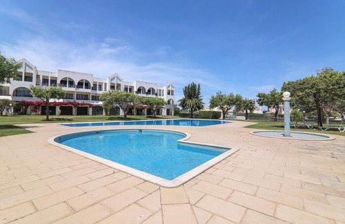 Santa Eulalia Apartment | Vacation Apartment "Apartamentos Ninho das Gaivotas 509" with Pool, Wi-Fi, A/C, Balcony & Garden; Parking Available