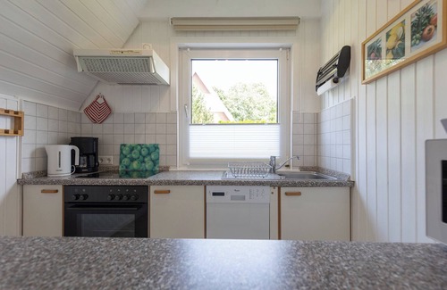 Dorumer Neufeld House | Vacation home Rotersand 2 - charming and in the middle of the action.