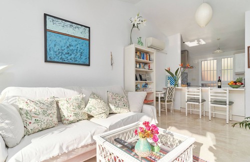 Almunecar House | Vacation Home "Ático Capela Vistas Al Mar" with Sea View, Shared Pool & Wi-Fi