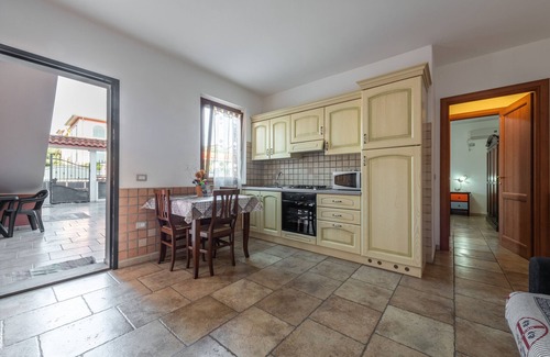 Sant'Antioco House | Vacation Home "Casa Vacanza L'Agave A" with Shared Terrace, A/C & Wi-Fi