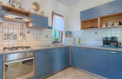Sisan House | Vacation home Corina by Interhome