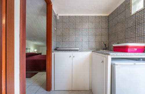 Sant'Antioco House | Vacation Home 'Il Lentischio - Rosmarino' in Cala Lunga 200 Metres from the Sea
