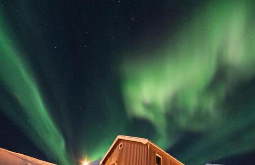 Botnhamn House | Vacation Home in Fjordgård with views of Segla and the Fjord