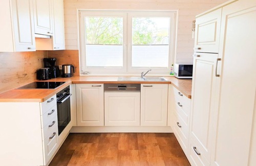 Schonberg House | Vacation home Ostseelodge - Holiday home with sauna, fireplace, garden house