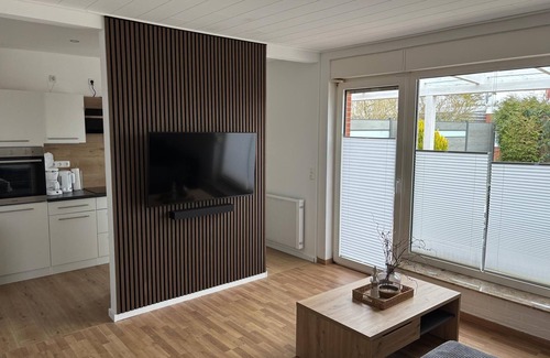 Dornumersiel House | Vacation home Wellenperle