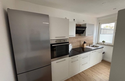 Dornumersiel House | Vacation home Wellenperle