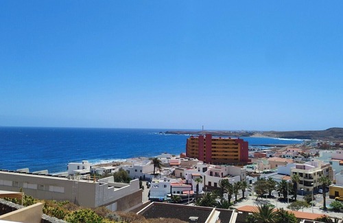 Poris de Abona Apartment | Vacation 'Vista Bahia' with Sea View, Shared Pool and Wi-Fi