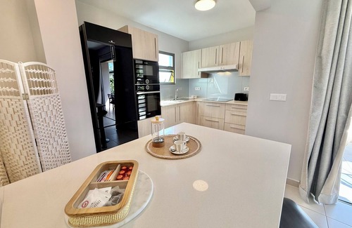 Papeete Condo | Vaiana City Apartment - relaxing downtown Papeete - garden view, A/C - WiFi