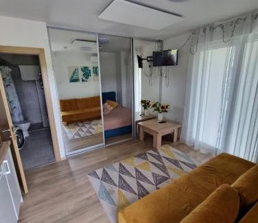 Palanga Apartment | Vaivorykštės 7D apartamentai su baseinu vasaros metu