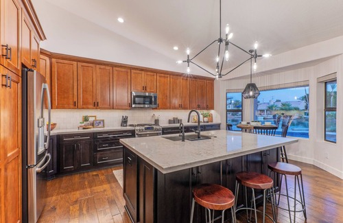 Crystal Shores House | Val Vista Lakefront Gem, Game Room, Htd Pool, Patio TV, Fire Pit, Kayaks, Bikes