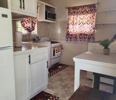 Graeme Hall Park Apartment | Valdu Cozy Cottage