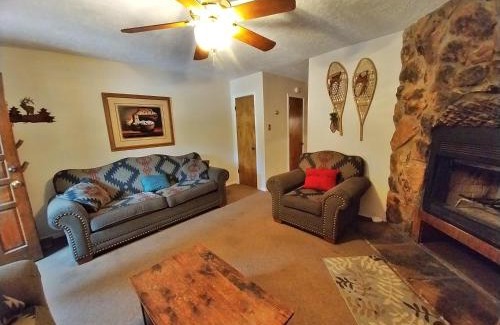 Red River House | Valley Condo 124 - Creekside - WiFi - Hot Tub - Fireplace - Washer - Dryer - Playground