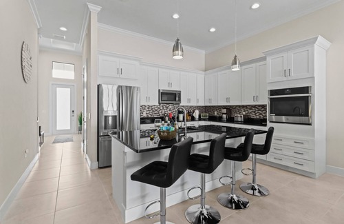 Naples Park House | Vanderbilt Beach, New Home, heated saltwater pool and spa.