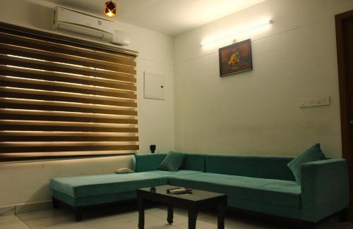 Palayam Apartment | Vantage Dew Palace by livNstay