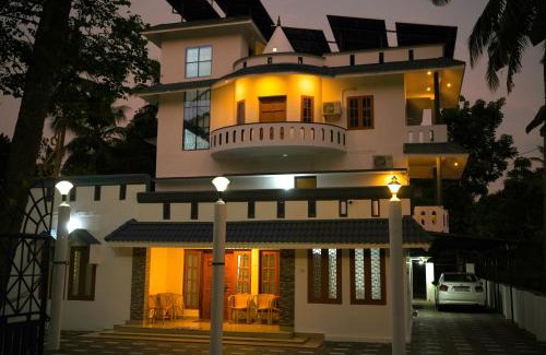 Varkala Villa | Varkala- Aroma Ac pvt Villa hammocks kitchen
