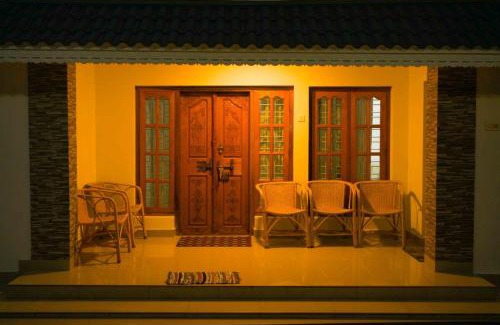 Varkala Villa | Varkala- Aroma Ac pvt Villa hammocks kitchen