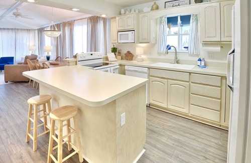 Lower Grand Lagoon House | Venture Out - #76 Gulf Loop, Peaceful beach cottage with BACKYARD and golf cart