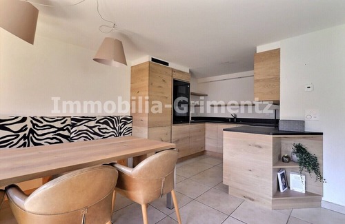Grimentz Apartment | Very comfortable flat on 2 levels for 5 to 6 people, living room with wood-burner, kitchen area with