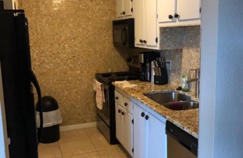 Madeira Beach Condo | Very Comfortable, Couples Retreat, Waterfront &1 Block to Beach wKing Sleep# Bed
