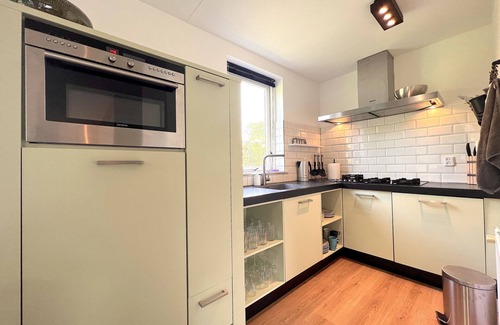 Ewijk House | Very stylish holiday home with hot tub and sauna