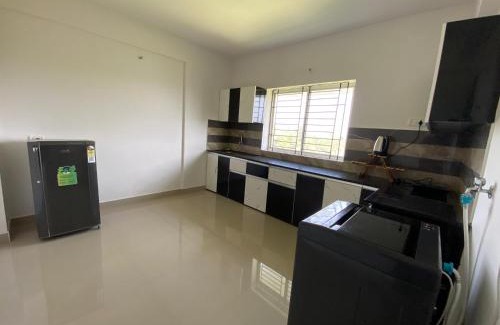Kumbalam Apartment | Veu Ragamalika Apartment with Fully Equipped Kitchen, Balcony & Caretaker