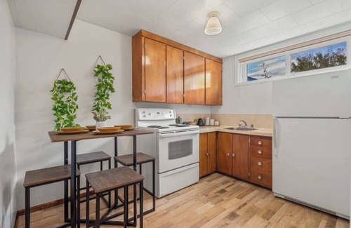 Drumheller House | Vibrant basement suite, blending style and comfort for a delightful stay.