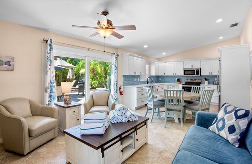 Holmes Beach Cottage | Vibrant Island Retreat with Pool, Tiki Table and Walk to Beach