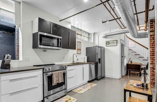 Downtown Greensboro Condo | Vibrant, Stylish, Condo Downtown! Captivating Open Layout! Walking distance to major attractions! Free High-Speed Internet!