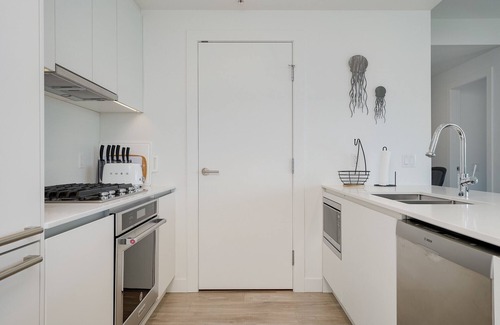 Victoria Condo | Vic West Gem, workspace, 2 parking spots, AC, Harbor Views off big balcony & Outdoor pool/lounge