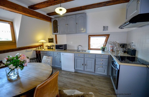 Riquewihr Apartment | View over the vines in a completely renovated Alsatian house.