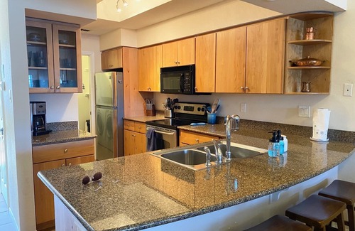 Lago Vista Condo | VILLA 2302 - Top Floor Lakefront Views - Private Grill - Island Amenities