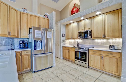 Pelican House | Villa Blue Water 1022 SW Cape Coral 4b 3ba luxury home electric heated pool and spa