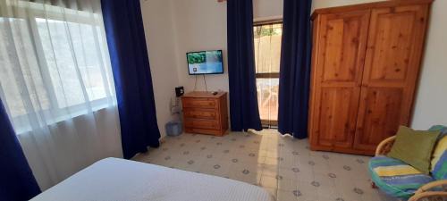 Xlendi Apartment | Villa Bronja Studio airconditioned apartment Xlendi