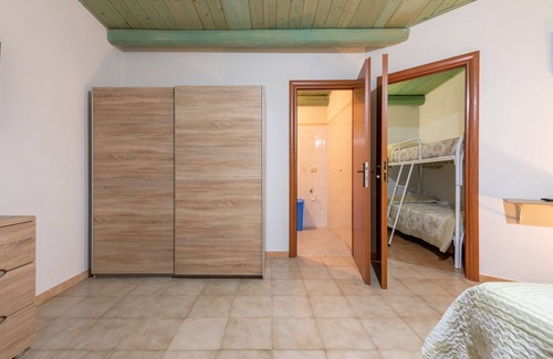San Giovanni Suergiu Villa | Villa 'Camera 3' with Shared Pool, Wi-Fi and Air Conditioning