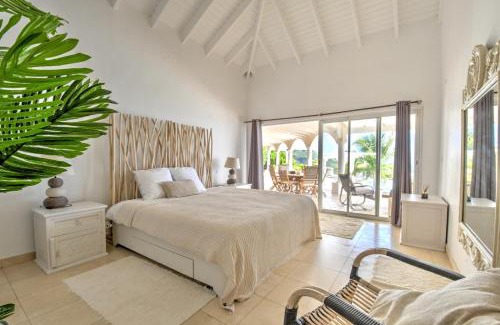 Orient Bay Villa | Villa Coralia - panoramic ocean view