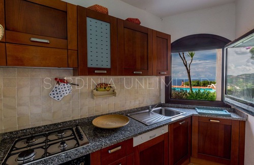 Costa Paradiso Villa | Villa Corbezzolo Giallo: with terrace, shared pool and barbeque