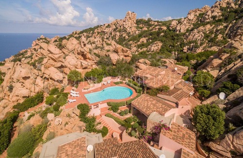 Costa Paradiso Villa | Villa Corbezzolo Giallo: with terrace, shared pool and barbeque